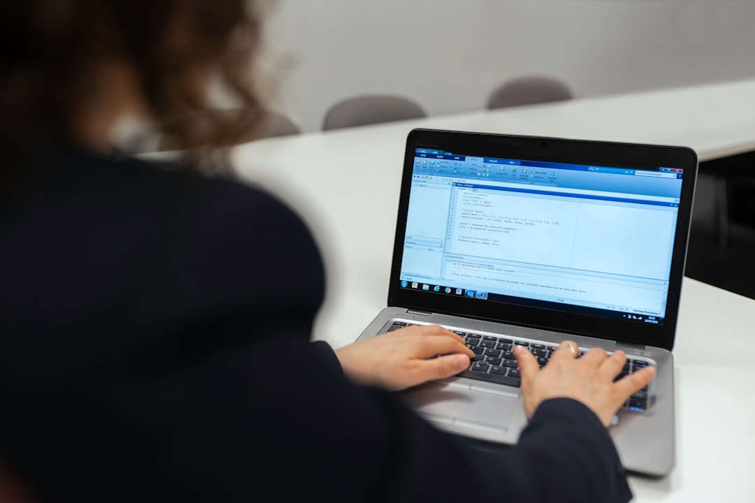 Female aerospace engineer inputs data